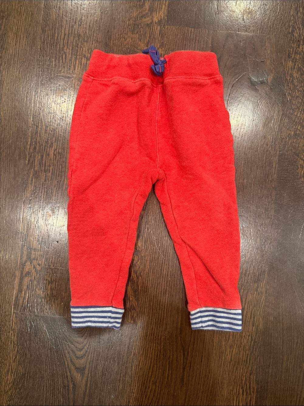 Baby Boden Red Jogger Pants with Blue Striped Cuffs and Star Detail on Backside